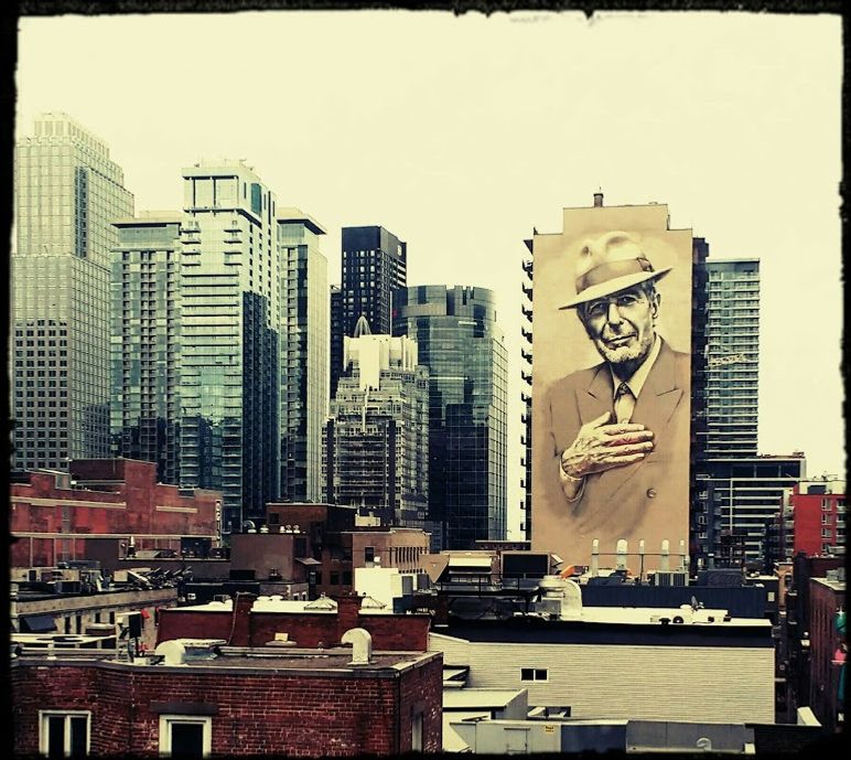 The Leonard Cohen mural, in downtown Montreal, viewed from the Musée des Beaux-Arts de Montréal