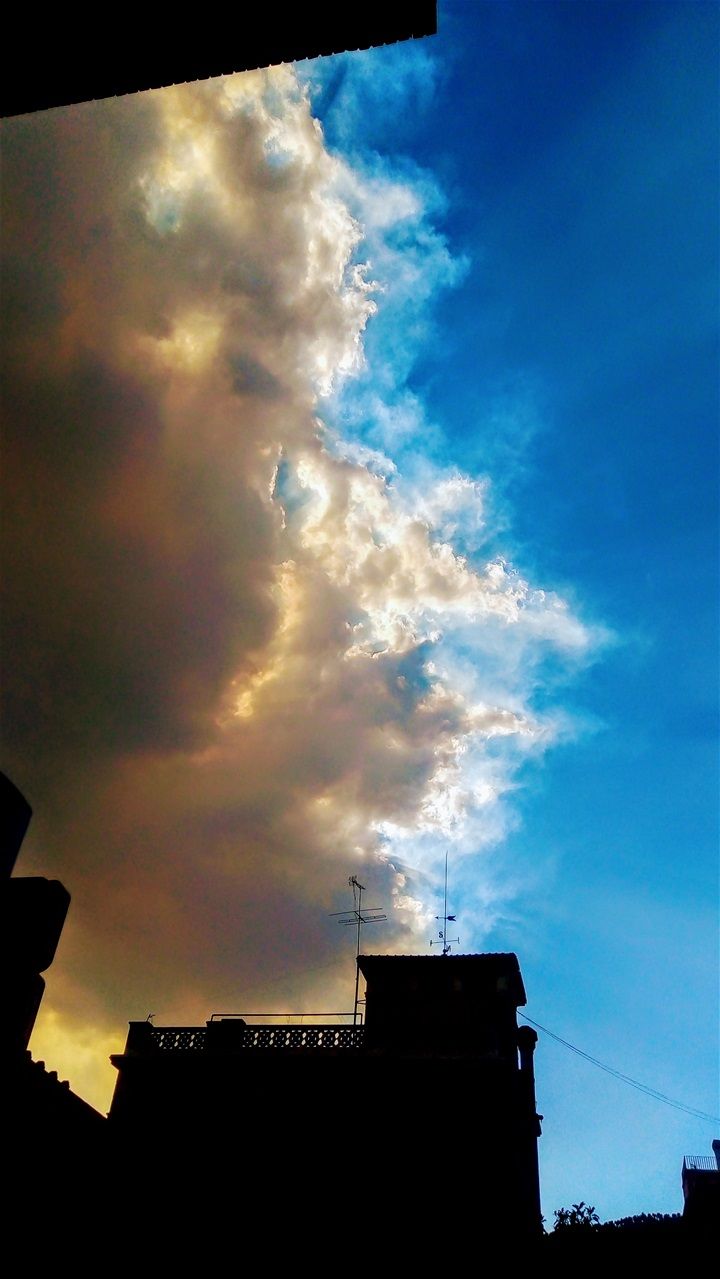April showers bring May flowers... Hopeful sky in Gracia